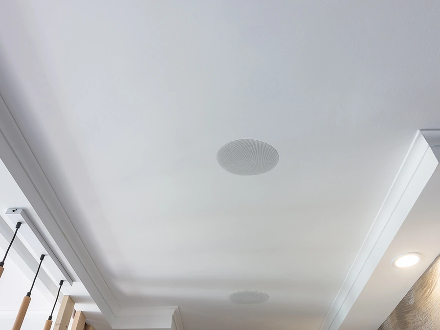 A modern living and lounge area with Lithe Audio multi-room ceiling speakers